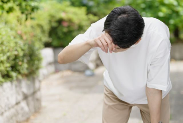 体調不良の男性